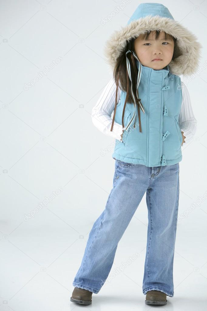 Young Girl In Winter Clothing