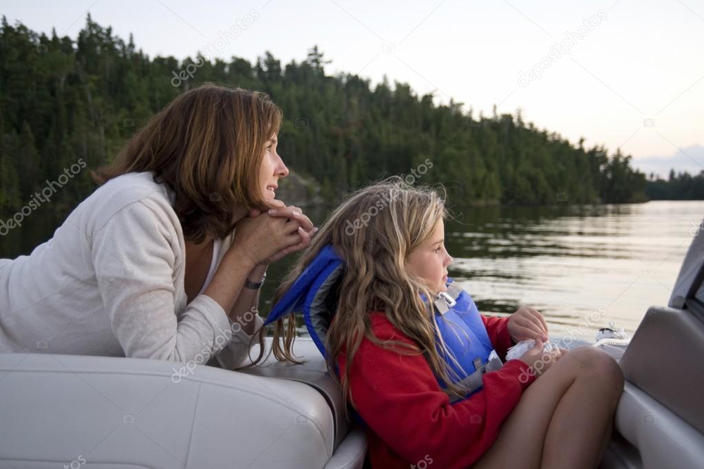 Mother and daughter boating