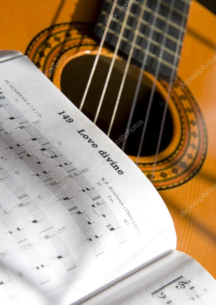 Guitar And Book Of Music