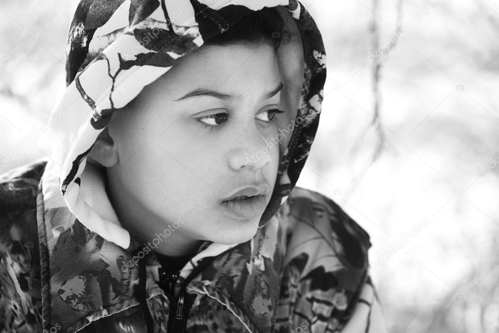 Teenage Boy In Camouflage Clothing