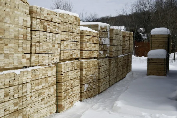 Softwood Lumber In Piles At Winter — Stock Photo, Image