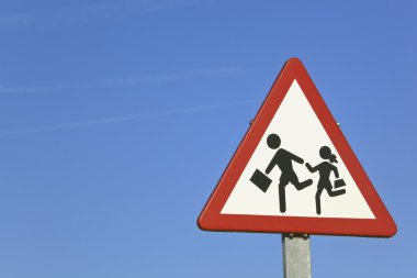Traffic Sign Warning Of Nearby School clipart