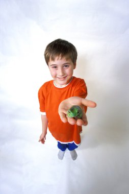 Full-length Portrait Of Boy With Frog clipart