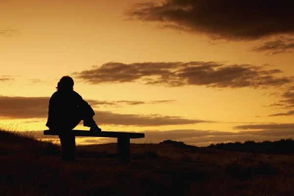 Woman Silhouetted By Sunset — Stock Photo, Image