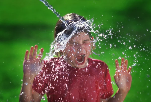 Girl pouring water — Stock Photo, Image