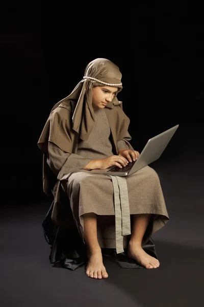 Young Jesus Using A Laptop — Stock Photo, Image