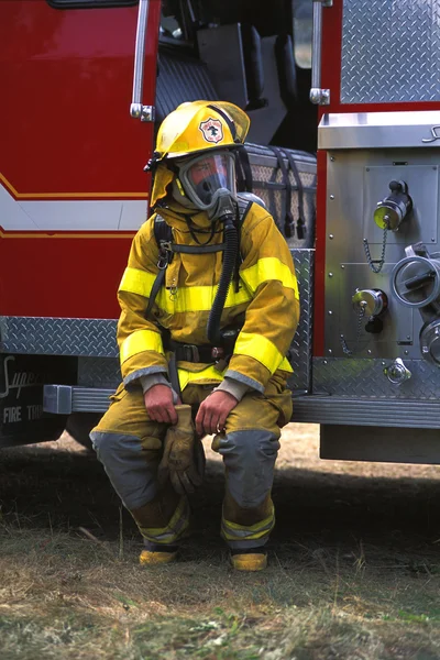 Fireman Sitting On Fire Truck — Stock Photo, Image