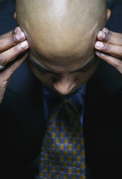 Businessman with headache — Stock Photo, Image