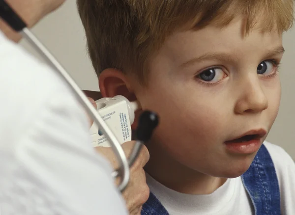 Boy Getting Ear Examined By Doctor — Stock Photo, Image