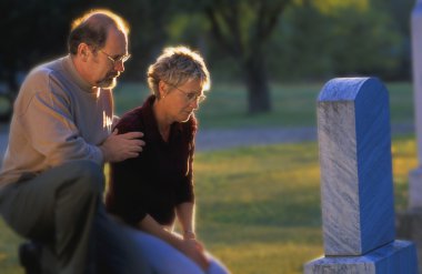 Couple Visiting Grave