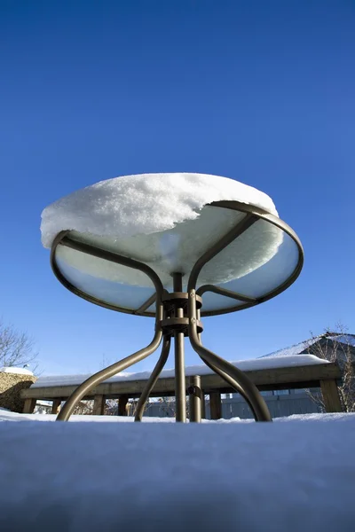 Snow Melting On A Patio Table — Stock Photo, Image