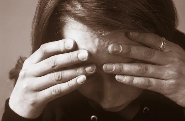 Woman With Face In Hands — Stock Photo, Image