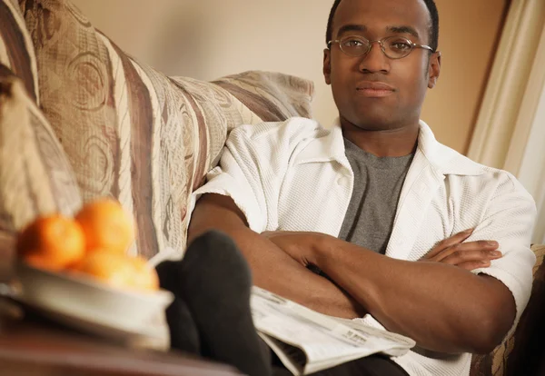 Man Relaxing On Sofa — Stock Photo, Image