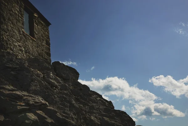 Rock Building On A Mountain — Stock Photo, Image