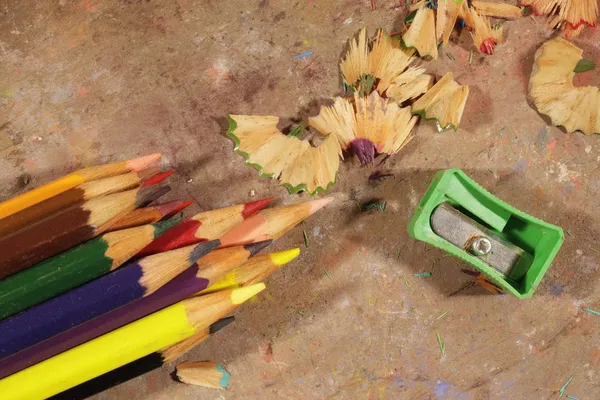 Coloured Pencils, Pencil Sharpener And Pencil Shavings — Stock Photo, Image