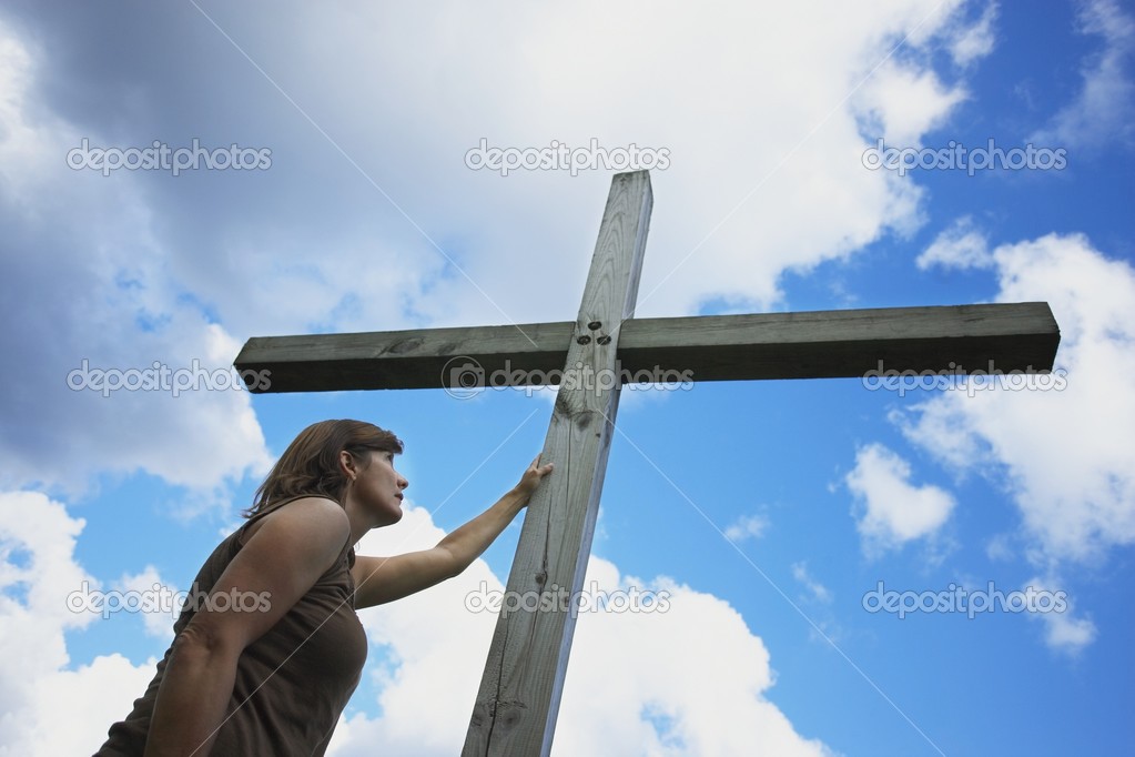 Woman Touches The Cross