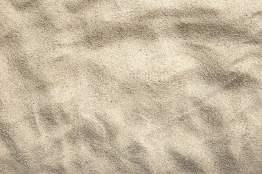 Yakın plan, kumlu doku, dalgalı arka plan. Soyut arkaplan.