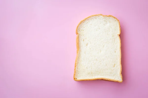 Pâine Subțire Feliată Fundal Roz — Fotografie, imagine de stoc