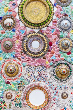 The Sangkhalok Bowl Lid with Stones Decorated The Wall in The Pagoda of Wat Phra That Pha Son Kaew on The Hill