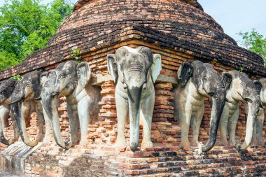 June 6, 2022, Sukhothai : Statue of elephants surrounded pagoda at Wat Sorasak,Temple in Sukhothai Historical Park, Sukhothai province,Thailand.