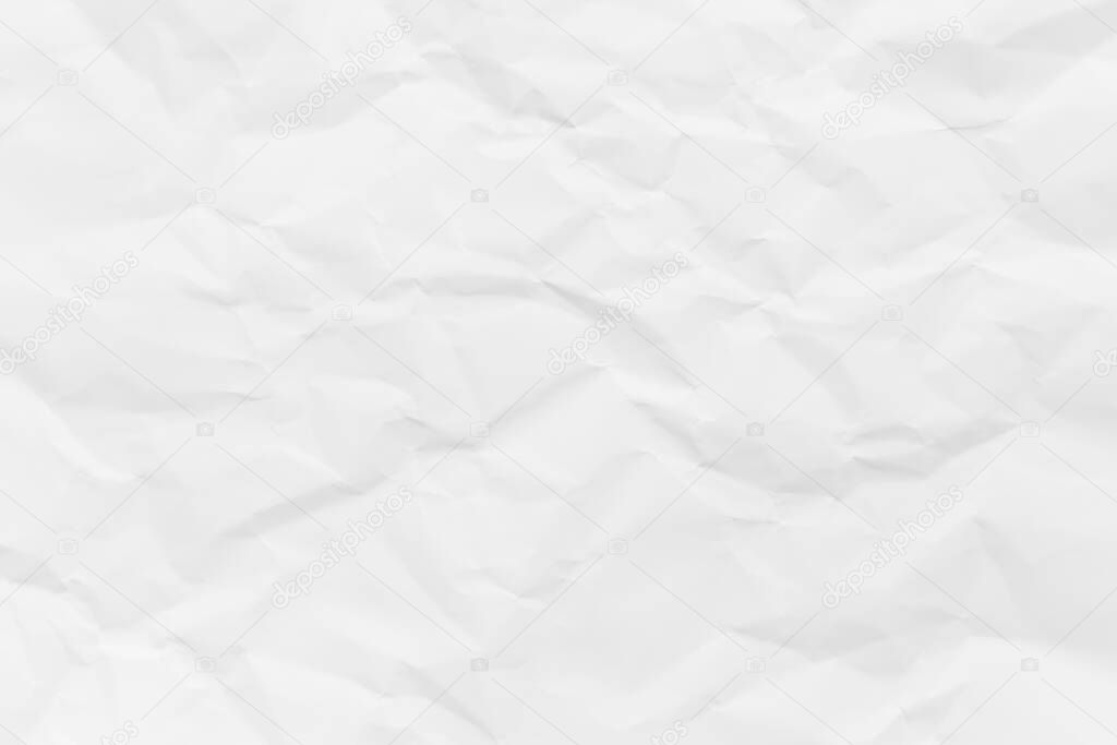 White crumpled paper texture background.