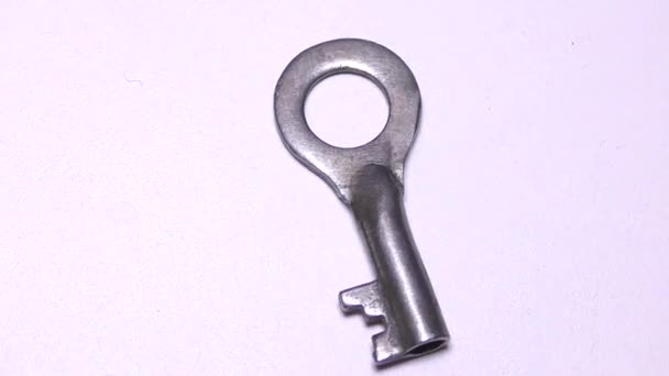 白色背景上的锁的键 — 图库视频影像