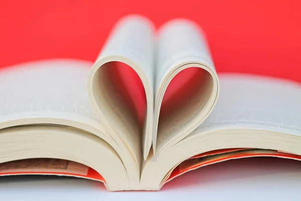 Heart on the book — Stock Photo, Image