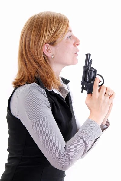 Perfil de bela jovem segurando uma pistola — Fotografia de Stock