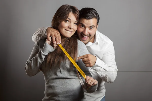Happiness and boldness couple showing off sex length — Stock Photo, Image