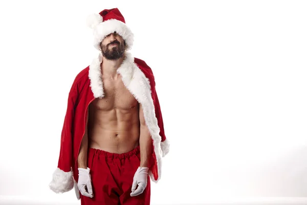 Weihnachtsmann Bodybuilder Zeigt Seinen Athletischen Körper Auf Weißem Hintergrund — Stockfoto