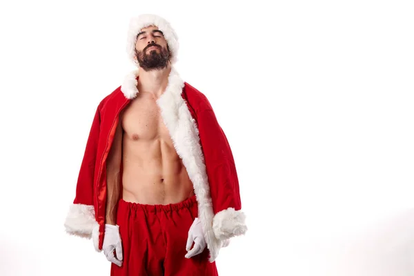 Stock image Santa Claus bodybuilder showing off his athletic body on a white background