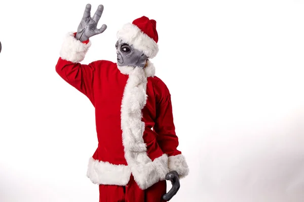 Kerstman Met Alien Masker Een Witte Achtergrond — Stockfoto
