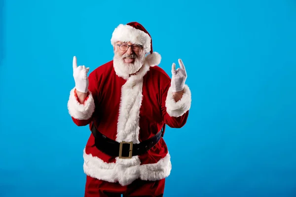 Jultomten Gör Rocker Gest Blå Bakgrund — Stockfoto