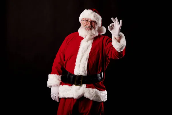 Santa Claus Haciendo Gesto Sobre Fondo Negro —  Fotos de Stock