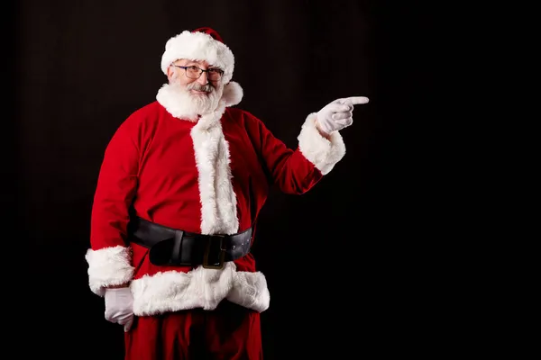 Santa Claus Ukazuje Prstem Billboard Černém Pozadí Royalty Free Stock Fotografie