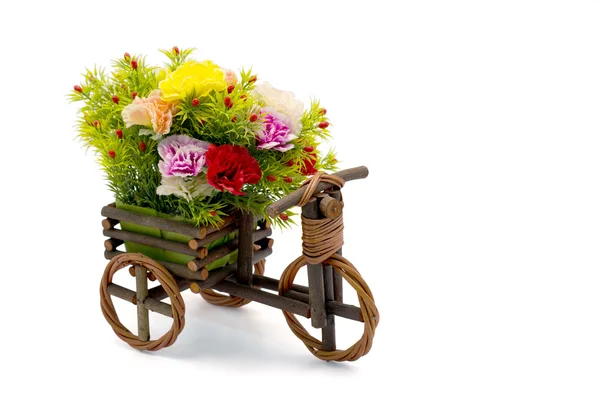 Wooden bicycle with colorful carnations on white and clipping path — Stock Photo, Image