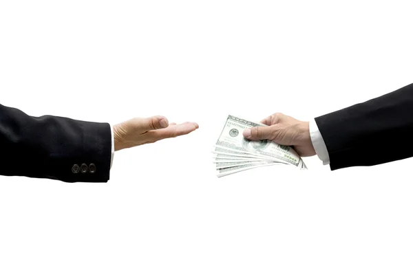 Hand giving cash to another hand — Stock Photo, Image