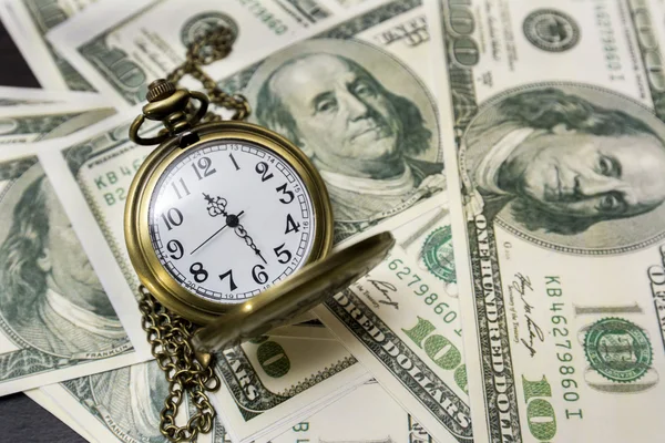 Pocket watch and dollar bills. Time makes money — Stock Photo, Image
