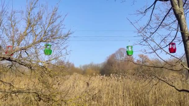 Green Colored Cableway Cabins Passing Each Other Early Spring Fun — Stock Video