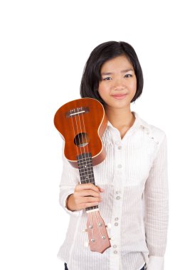 bir ukulele tutan genç bir Asyalı kız