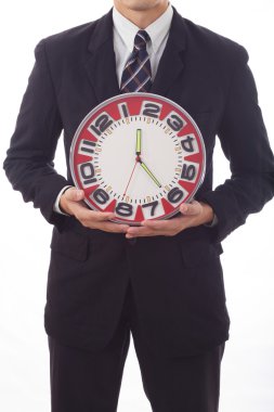 İş adamı saat tutuyor.