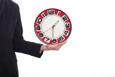 İş adamı saat tutuyor.