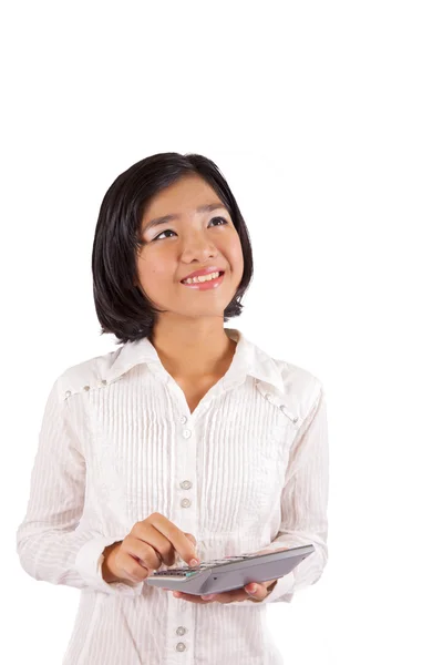 A young Asian girl holding a calculator — Stock Photo, Image