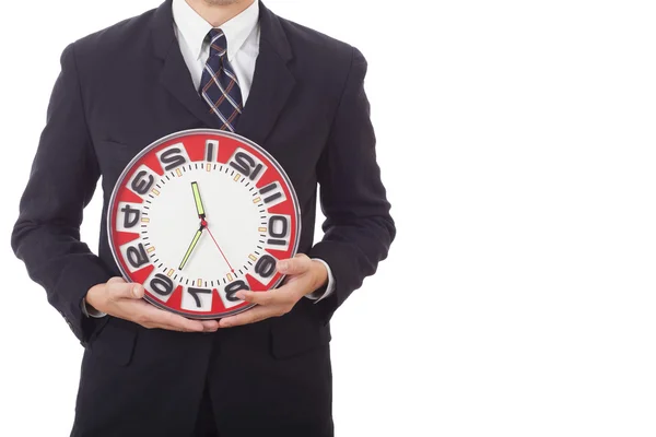 Businessman holding a clock — Stock Photo, Image