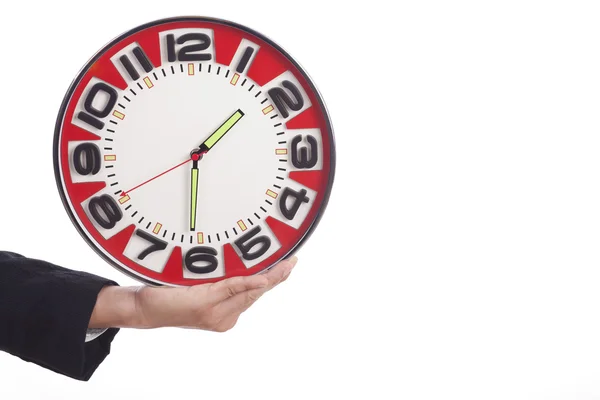 Businessman holding a clock — Stock Photo, Image