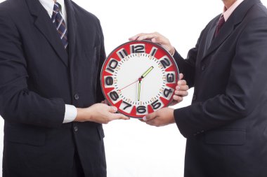 iki işadamları saat dayanıyor