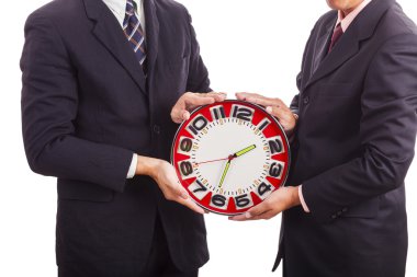 iki işadamları saat dayanıyor