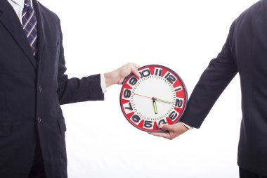 iki işadamları saat dayanıyor