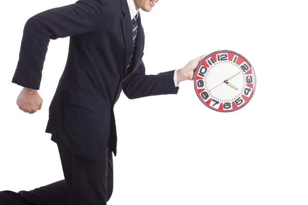 Businessman holding a big red clock — Stock Photo, Image