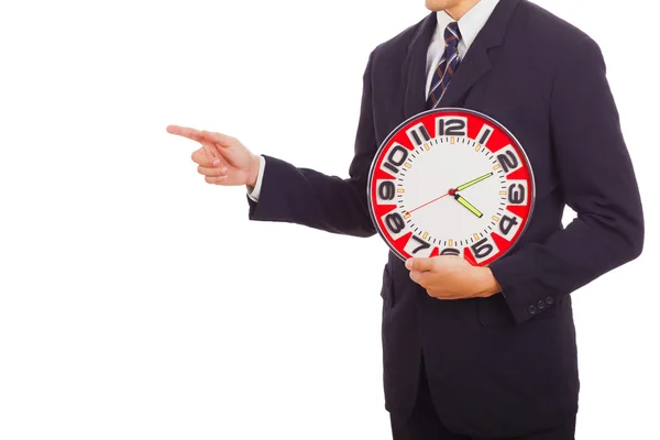 Businessman holding a clock — Stock Photo, Image